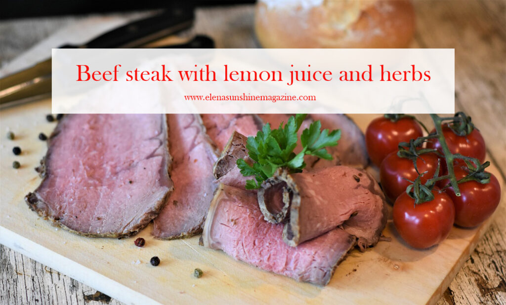 Beef steak with lemon juice and herbs