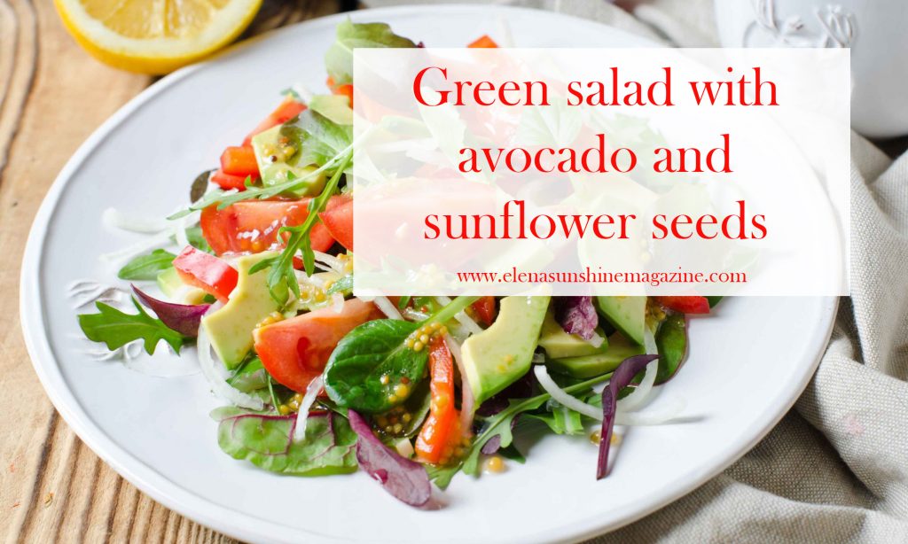 Green salad with avocado and sunflower seeds