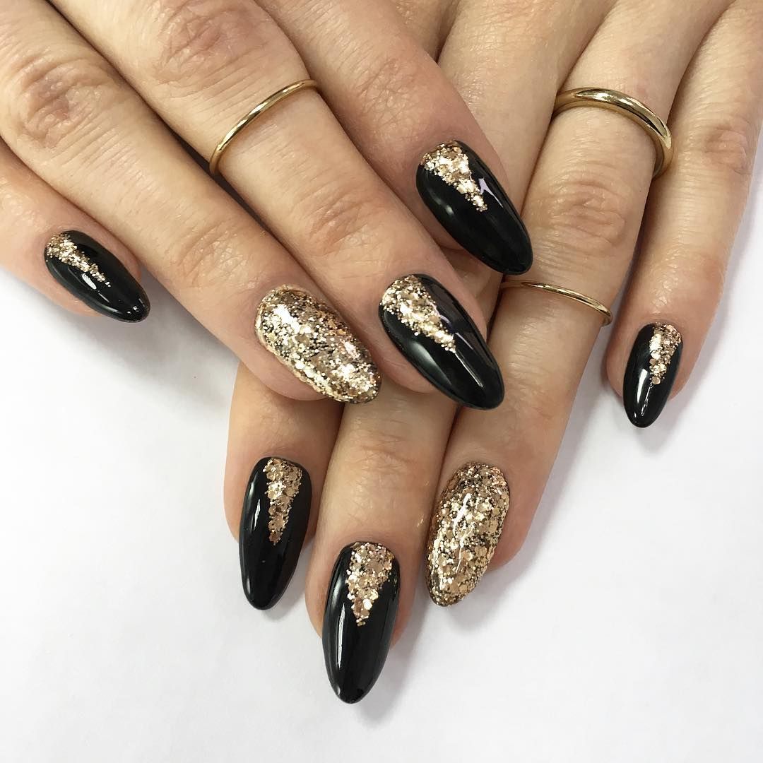 Black manicure with gold
