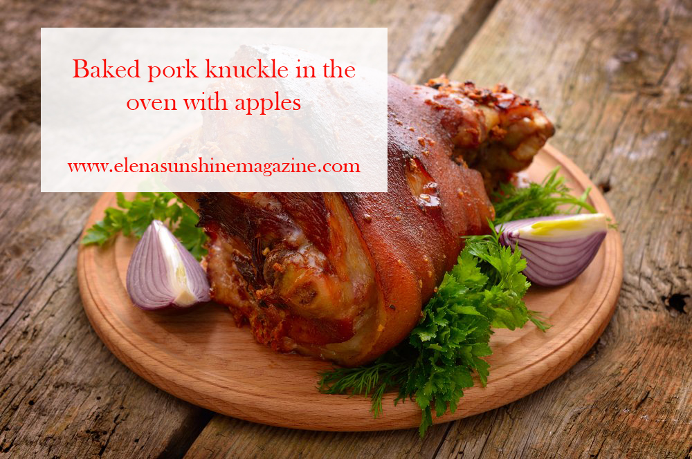 Baked pork knuckle in the oven with apples