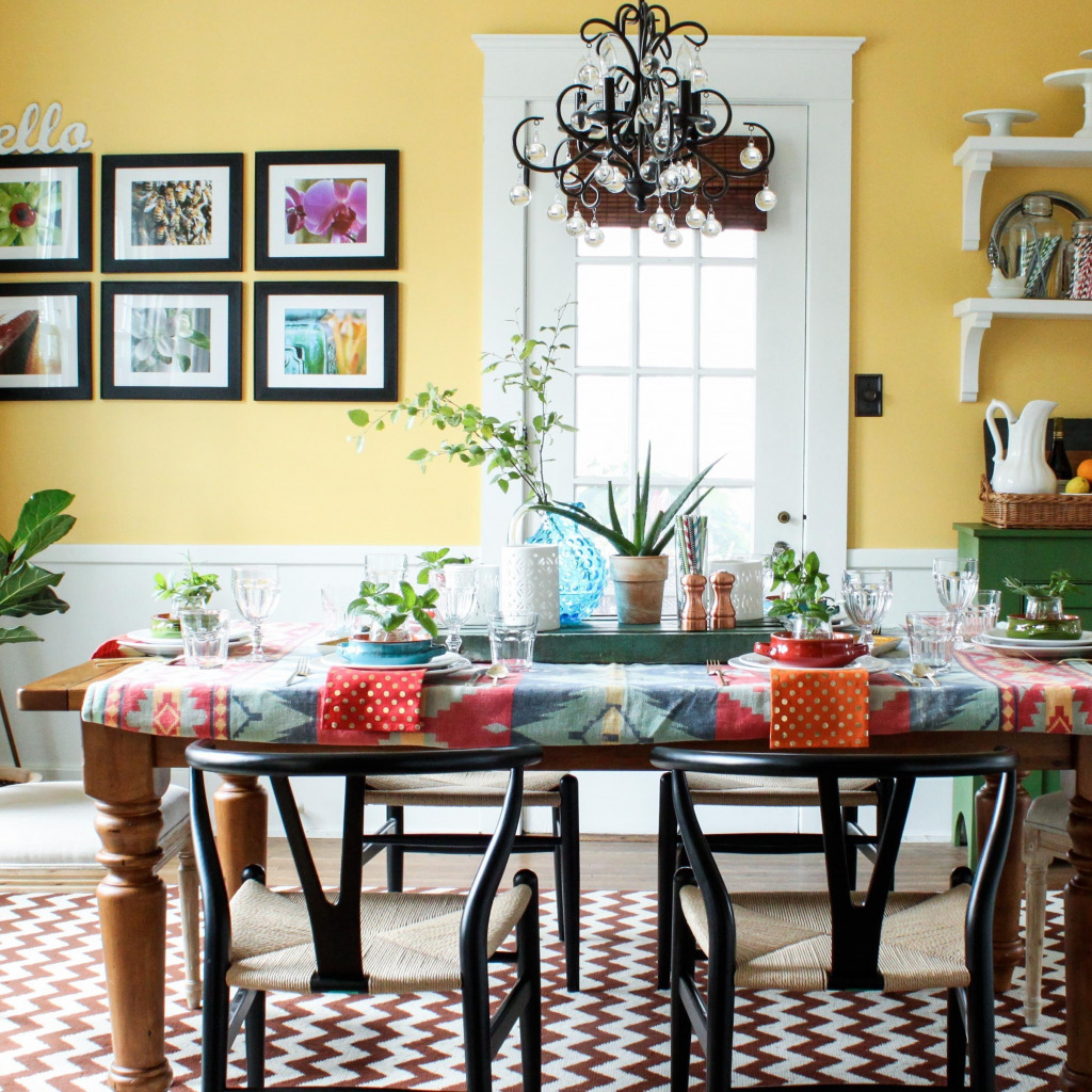 a bouquet of green flowers in the dining room