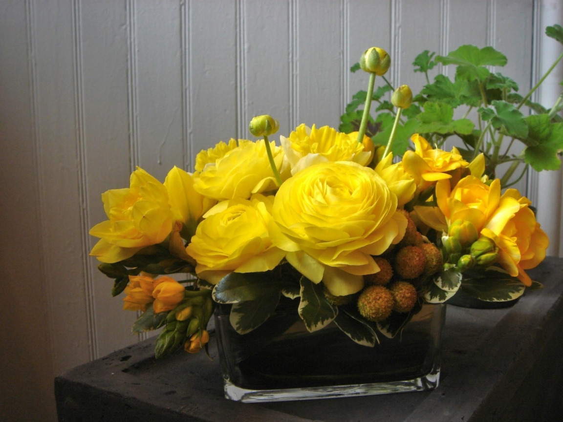 bouquet of roses and garden buttercups