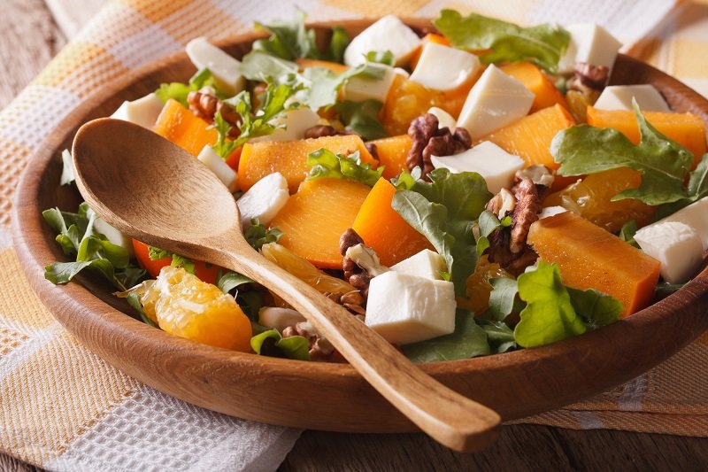 Orange salad with tangerines and persimmons