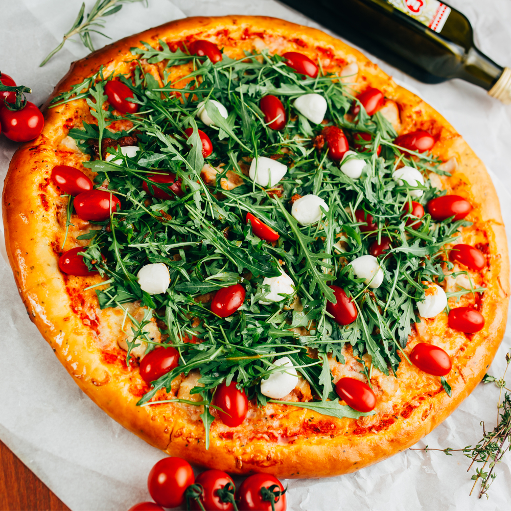 Pizza With Pesto, Mozzarella, And Arugula Microgreens