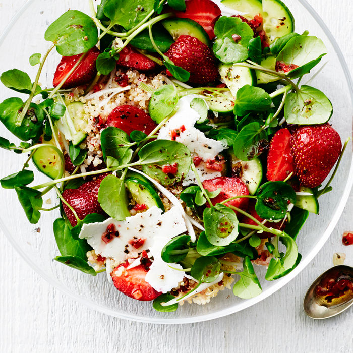 Salad with avocado, strawberries and micro-greens