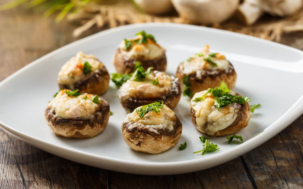 Mushrooms stuffed with cheese and herbs