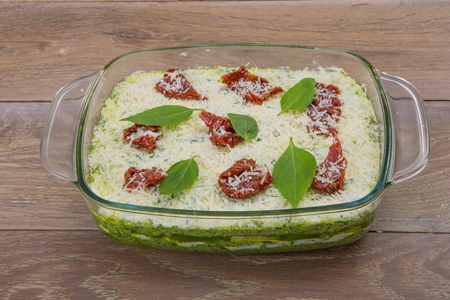 Zucchini lasagna with ricotta and pesto sauce