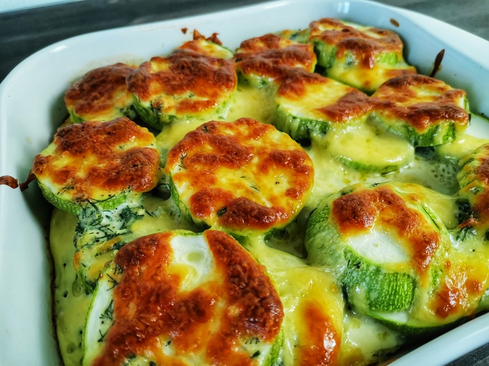 Zucchini baked with cheese, sage and bacon