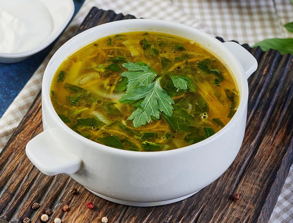 Summer soup of dandelion leaves, sorrel and nettle