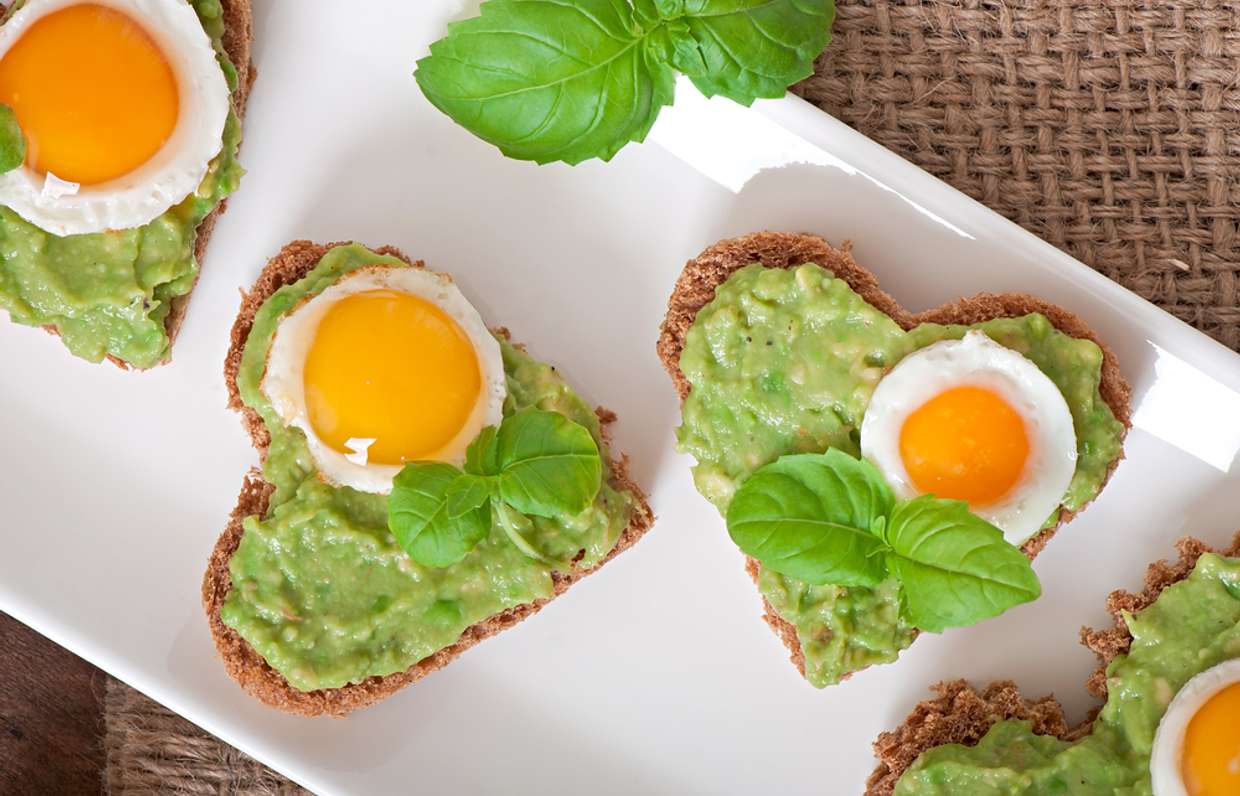 Toast with avocado and quail eggs